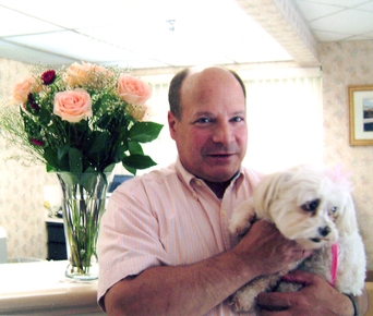 At Brandywine, visiting pets are warmly welcomed by residents and staff alike, beginning with Administrator Fred DiBartolo.